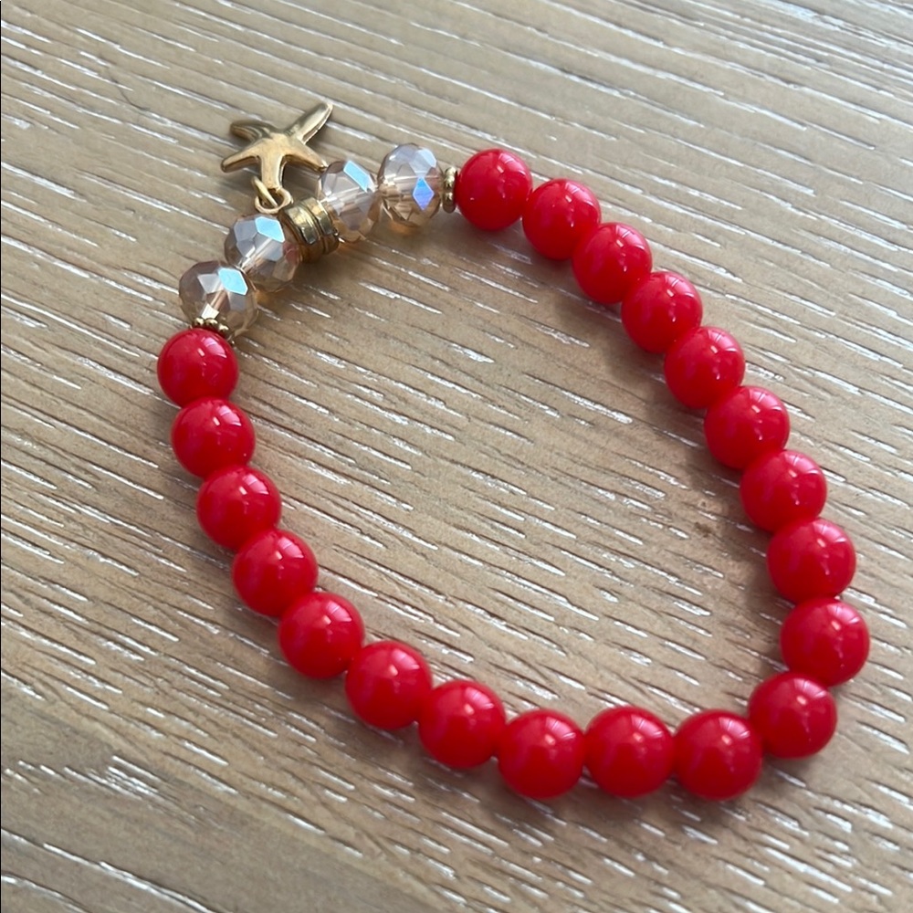 Elegant Red Beaded Bracelet with Gold Accents